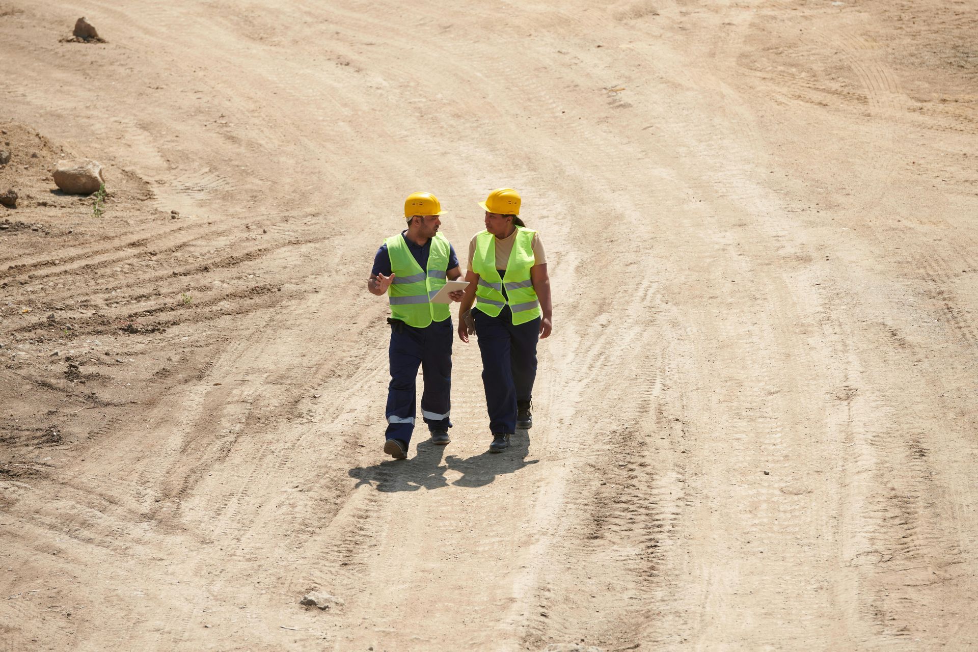 StrikeMatz utility-protection boards installed on a live construction site